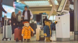 Heathrow Bears with luggage tags - image Heathrow Airport