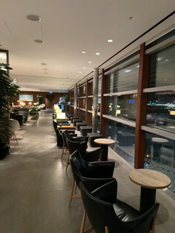 a row of chairs and tables in a room