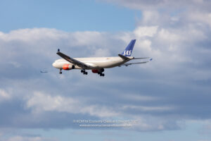 a plane flying in the sky
