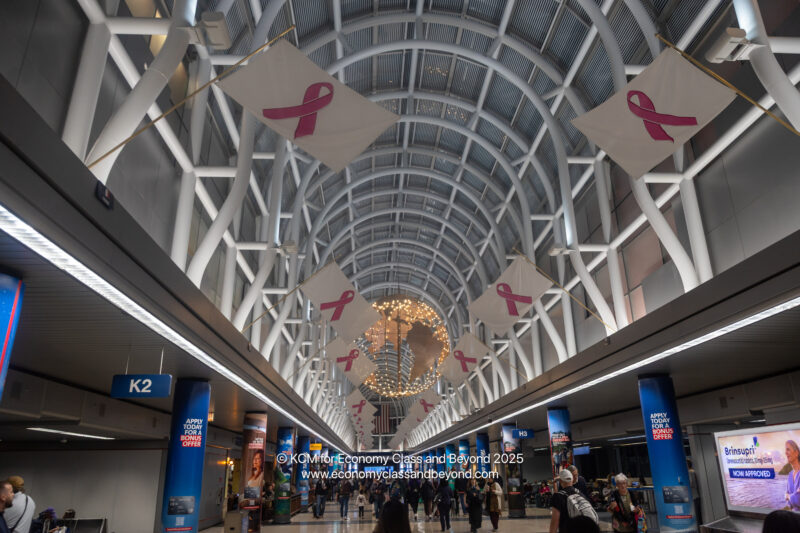 a group of people walking in a building