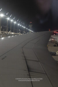an airplane wing at night