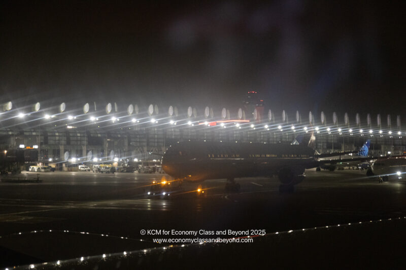 an airplane on a runway at night