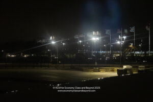 a street lights and flags at night