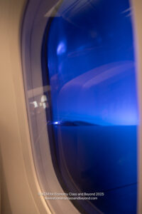 a blue light on a window