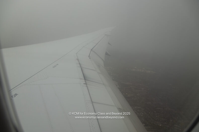 an airplane wing in the sky