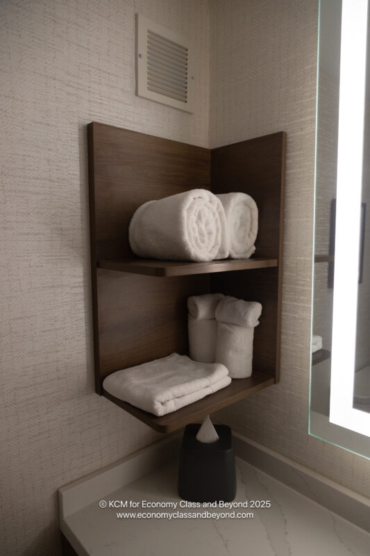 a shelf with towels and towels on it
