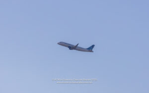 a plane flying in the sky