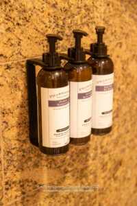 a group of bottles on a wall