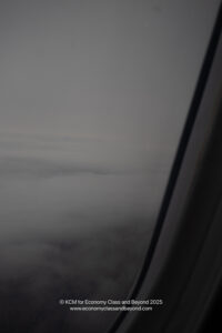 a view of clouds from an airplane window