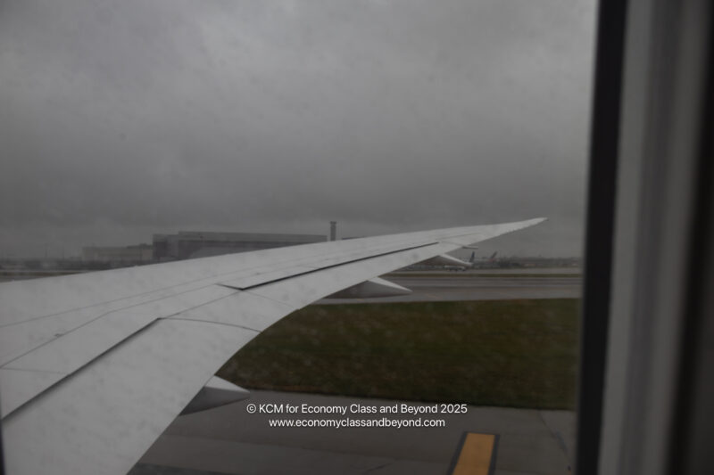 an airplane wing on a runway
