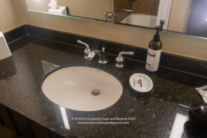 a bathroom sink with soap and soap dish
