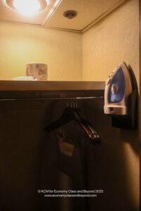 a iron and swingers on a shelf