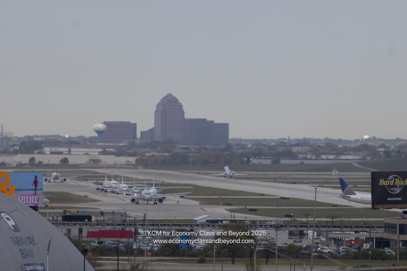a group of airplanes on a runway
