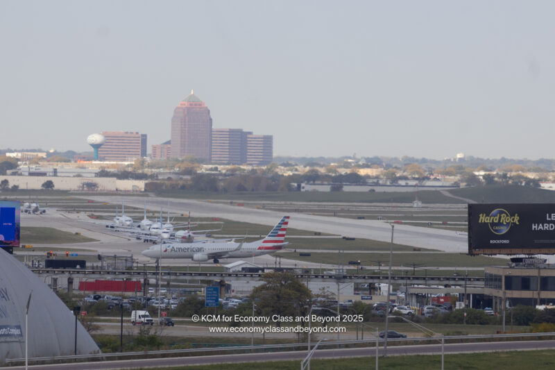 an airport with airplanes on the runway