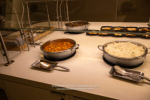 a counter with food in pots