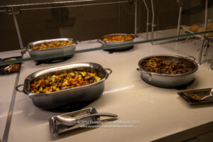 a group of pans with food in them