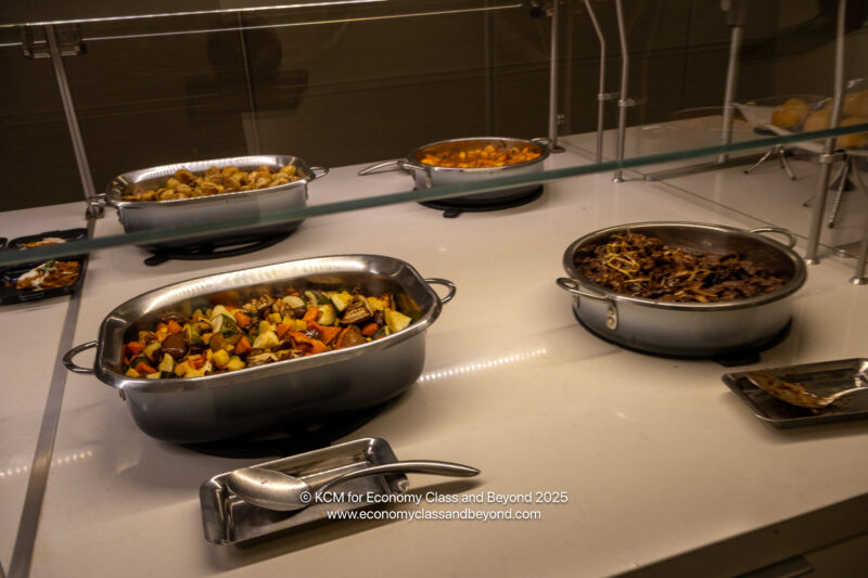 a group of pans with food in them