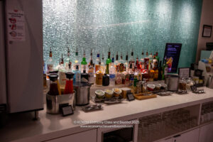 a bar with many bottles of alcohol