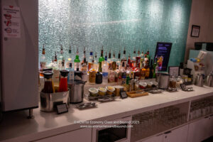 a bar with many bottles of alcohol