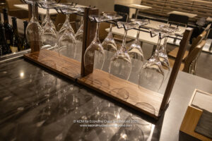 wine glasses on a rack