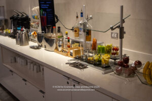 a bar with different drinks and utensils