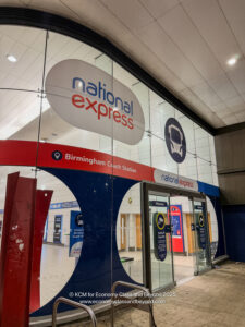 a glass wall with a sign on it