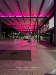 a building with pink lights
