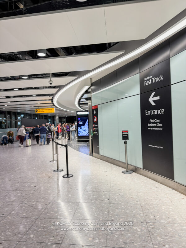 people walking around a building