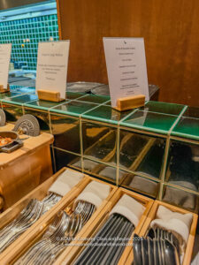 a counter with plates and forks