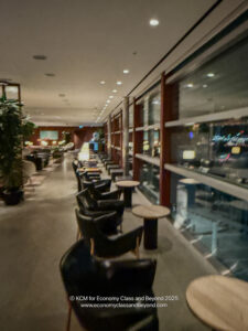 a row of chairs and tables in a room