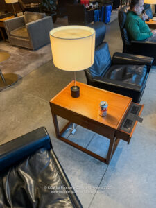 a table with a can of soda on it