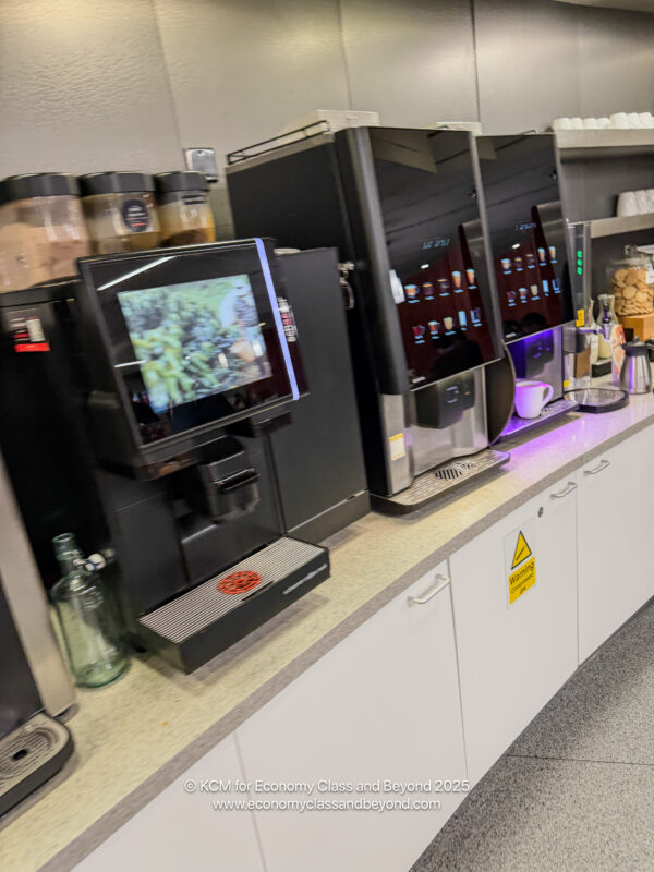 a coffee machine and coffee maker on a counter