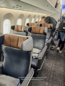 a man standing next to a plane