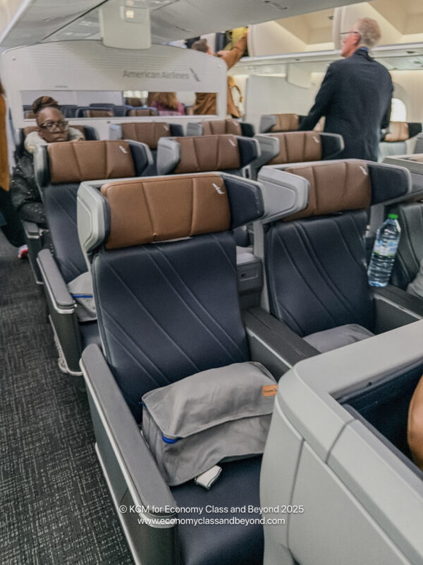 a woman sitting in an airplane
