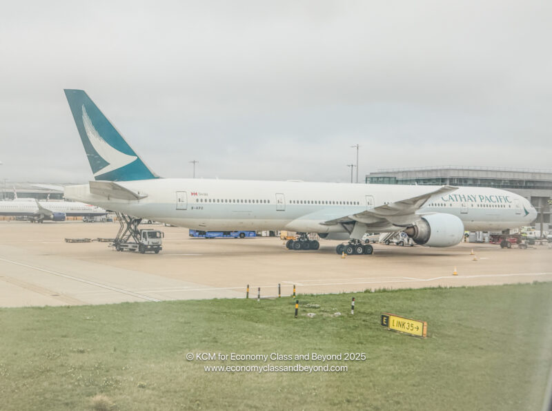 a large white airplane on a runway