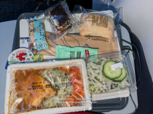 food in plastic bags on a tray