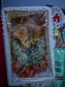 a plastic wrap with chicken in it