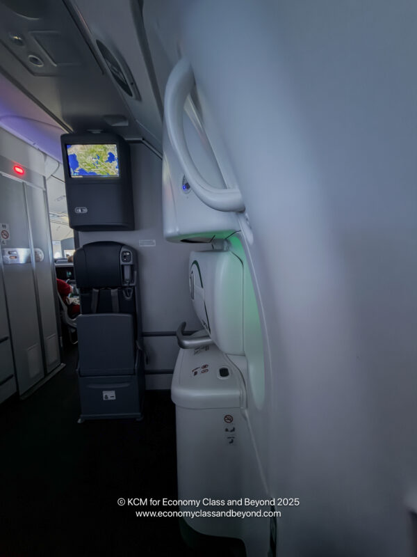 a white object with a screen on the side