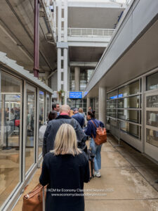 a group of people walking in a building
