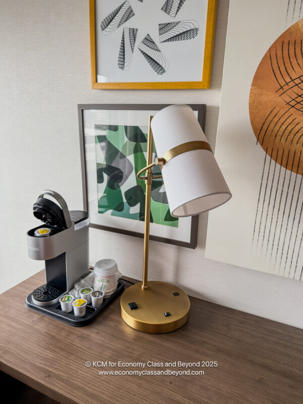 a coffee machine and lamp on a table