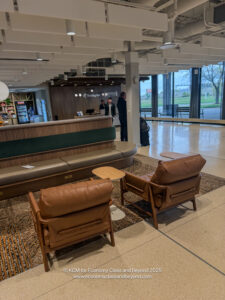 a lobby with chairs and a table