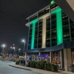 a building with green lights