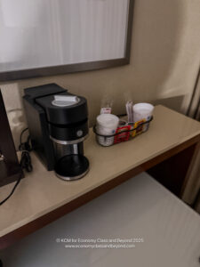 a coffee machine and coffee cups on a table