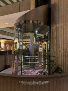 a glass elevator in a building