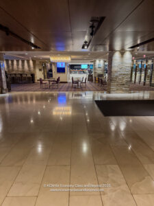 a large room with glass doors and tables