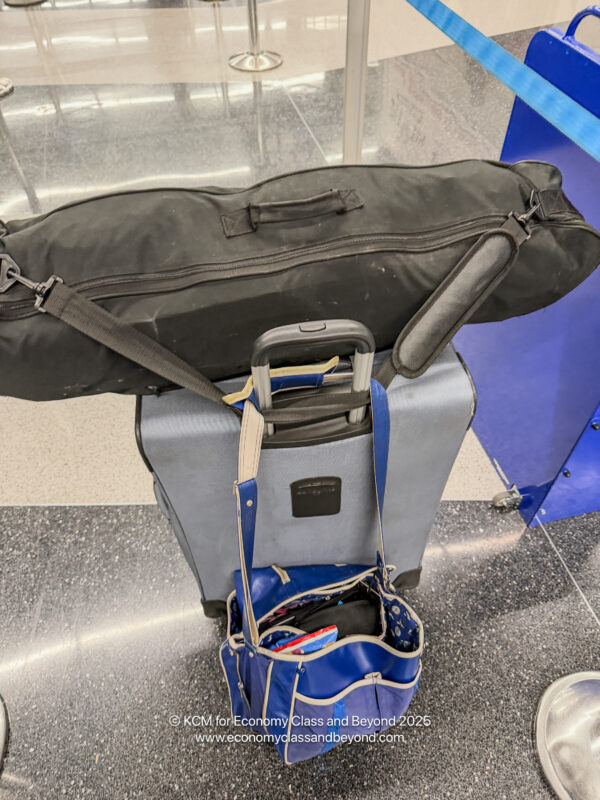 a bag and luggage on top of each other