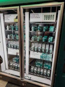a refrigerator with drinks and cans
