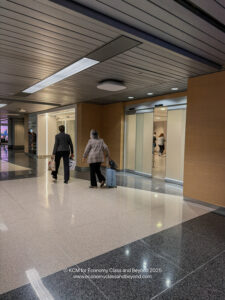 people walking in a building with a couple of people