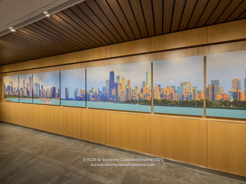 a wall with a painting of a city