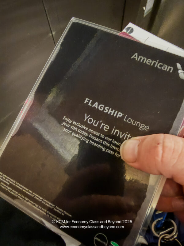 a hand holding a card